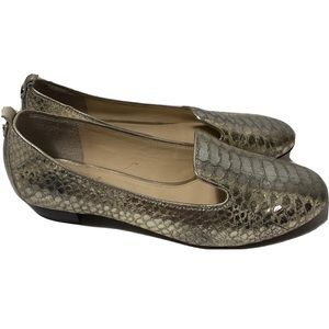 VC Signature gold leather loafers. Size 7.5. In good condition.